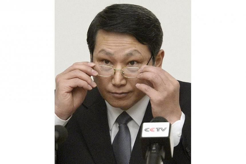 South Korean missionary, identified by the North as Kim Jong Uk, adjusts his glasses during a news conference in Pyongyang on Feb 27, 2014 file photo provided by Kyodo. North Korea sentenced Kim Jong Uk to life with hard labour on May 30, 2014 after 