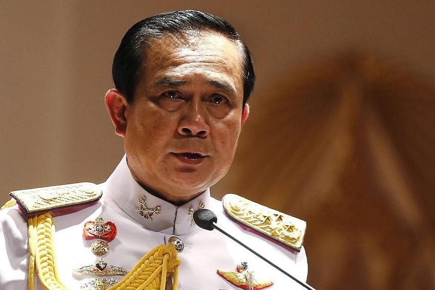 Thai army chief and junta head General Prayuth Chan-ocha speaks to journalists during a news conference at the Royal Thai Army headquarters in Bangkok, Thailand, on May 26, 2014.