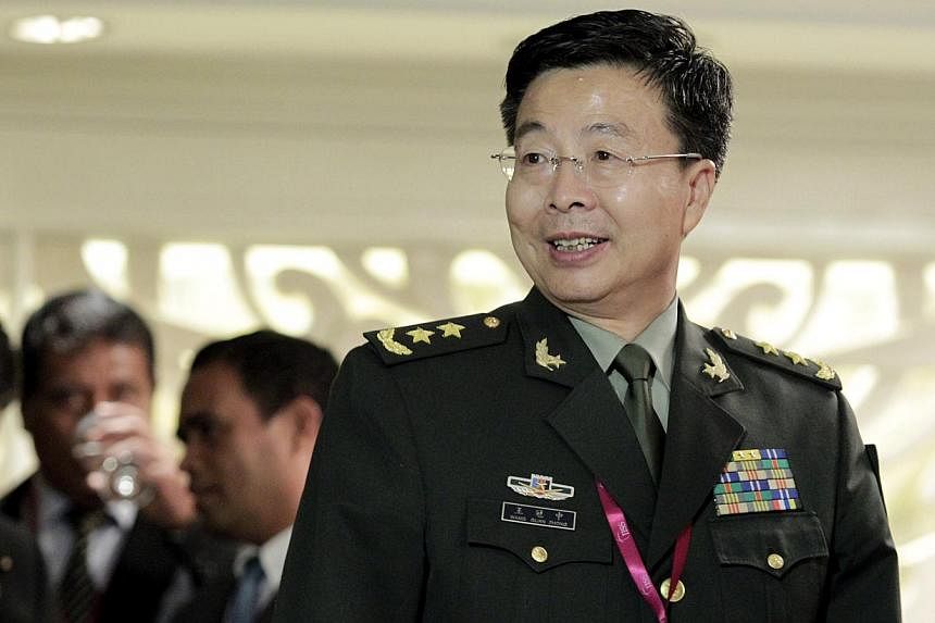 Lieutenant-General Wang Guanzhong, deputy chief of the general staff of the People's Liberation Army, at the 13th Shangri-La Dialogue in Singapore on May 31, 2014. -- ST PHOTO: NEO XIAOBIN