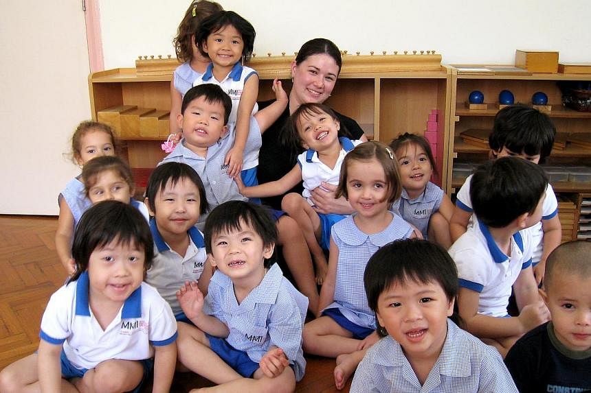 Ms Rebecca Cheong, an early childhood teacher at Modern Montessori International (MMI) Pre-School. Well-known childcare firms such as MMI are setting up more affordable centres in the heartland, under a revised tender scheme which aims to make qualit