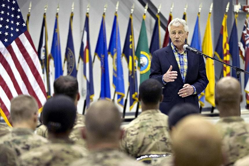 United States Defence Secretary Chuck Hagel speaks to members of the military during his visit to Bagram Airfield in Afghanistan on June 1, 2014. -- PHOTO: REUTERS&nbsp;