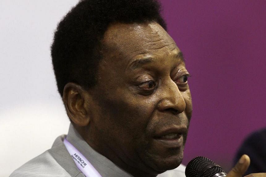 Brazil's soccer legend Pele gestures during a promotional event in Sao Paulo on May 23, 2014.&nbsp;A Brazilian court has sentenced football legend Pele’s son Edinho to 33 years in prison for laundering money for drug traffickers, media reports said