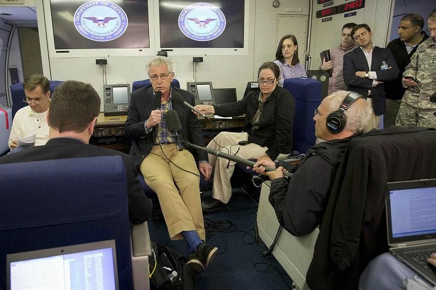 US Defence Secretary Chuck Hagel speaks during his flight abroad a U.S. military aircraft on June 1, 2014.&nbsp;United States Defence Secretary Chuck Hagel arrived in Afghanistan on a surprise visit on Sunday, following the release of soldier Bowe Be