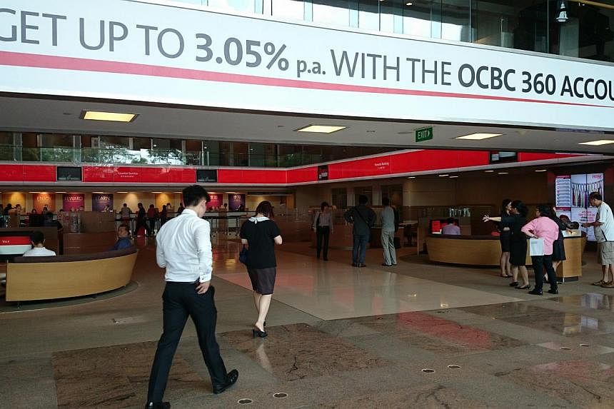 Young professionals have been flocking to OCBC's recently launched 360 account, with the bank reporting more than 18,000 people signing up for the account within the first month of its launch. -- PHOTO:&nbsp;OCBC