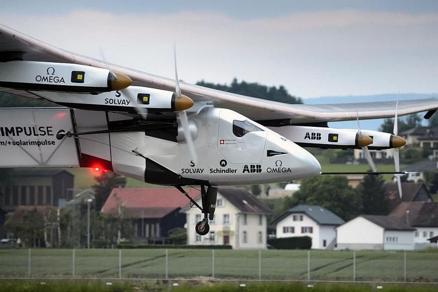The solar-powered Solar Impulse 2 experimental aircraft takes off during its maiden flight at its base in Payerne on June 2, 2014.&nbsp;A sun-powered plane made a successful test flight in Switzerland on Monday, clearing a vital hurdle towards its go