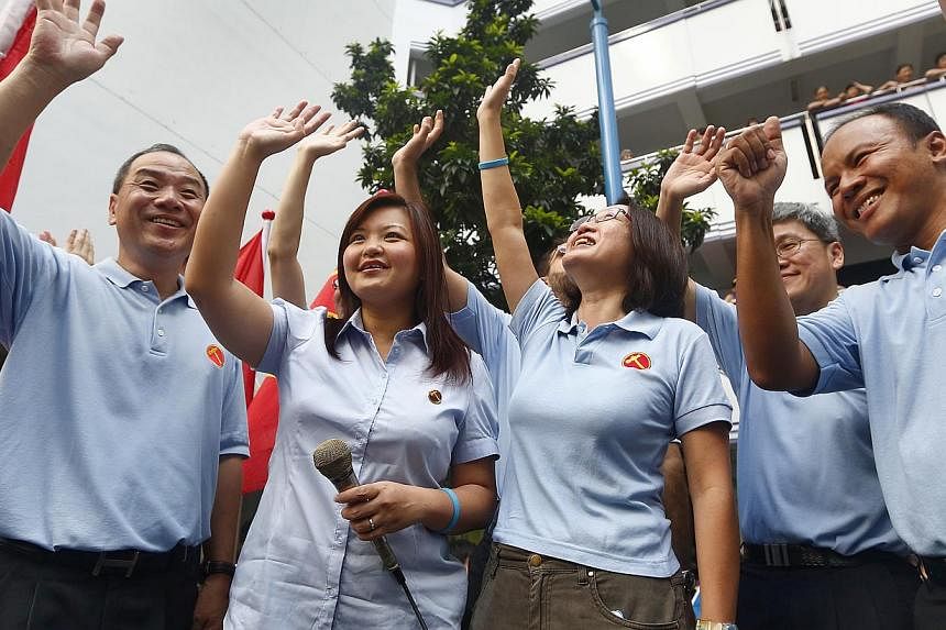 Workers' Party MPs during the party's thank you parade in Punggol East in January 2013. -- PHOTO: ST FILE