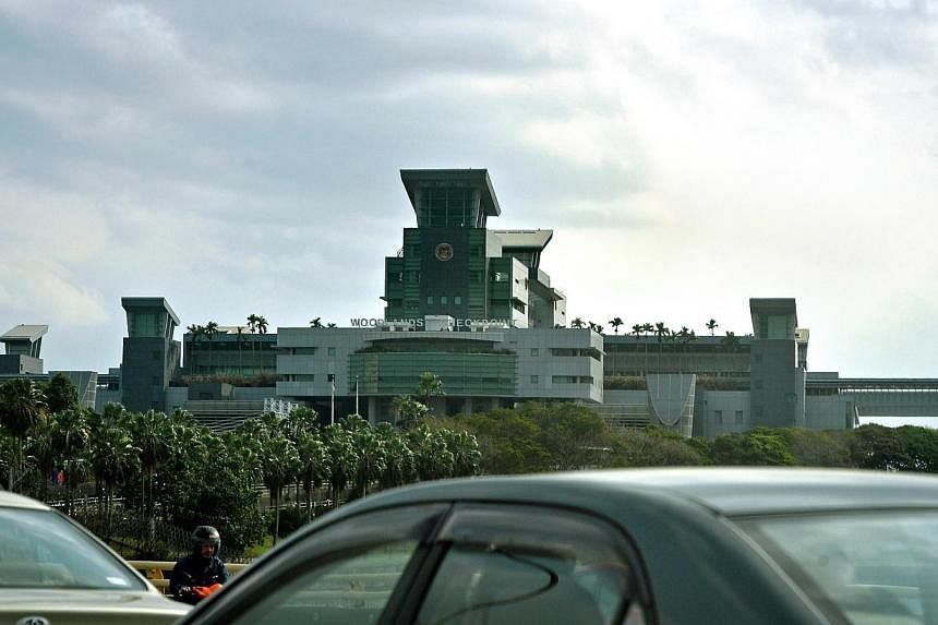 A Malaysian technician who entered Singapore at Woodlands checkpoint without presenting his passport for checking was sentenced to six weeks' jail on Tuesday, June 3, 2014. -- PHOTO: ST FILE