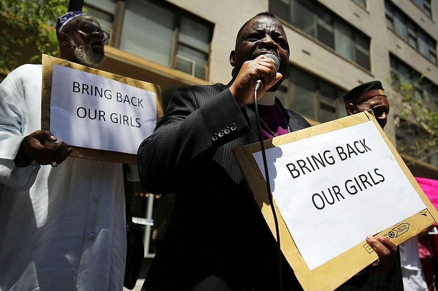A man speaks as local clergy, activists and and community leaders protest for the safe return of the 276 abducted schoolgirls outside the Permanent Mission of Nigeria to the United Nations on June 2, 2014 in New York City. -- PHOTO: AFP