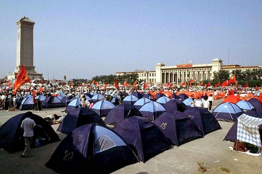 Pro-democracy demonstrators pitch tents in Beijing's Tiananmen Square before their protests were crushed by the People's Liberation Army in this June 3, 1989 file photo. June 4 marks the 25th anniversary of the suppression of pro-democracy protests i