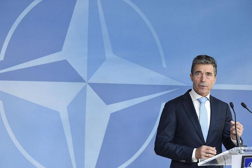 Secretary-General of the North Atlantic Treaty Organization (NATO) Anders Fogh Rasmussen gives a joint press conference before a Defence ministers meeting in Brussels on June 3, 2014.&nbsp;Nato head Anders Fogh Rasmussen dismissed presidential electi