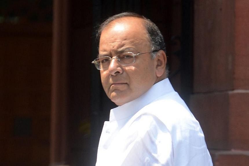 Indian Finance and Defence Minister Arun Jaitley arrives at the office of Indian Prime Minister Narendra Modi to attend the first cabinet meeting in New Delhi on May 29, 2014.&nbsp;Mr Jaitley said on Tuesday maintaining a balance between growth and i