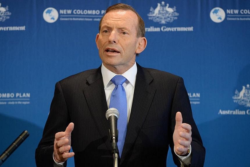Australian Prime Minister Tony Abbott on Tuesday brushed off an apparent Indonesian protocol breach in which reporters listened to a phone call between the two nations' leaders intended to repair strained relations. -- PHOTO: AFP