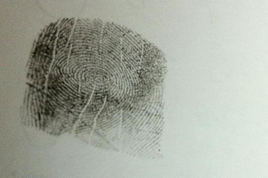 Criminals' days may be numbered after Dutch forensic experts discovered how to accurately date fingerprints, a breakthrough that could one day let police date crime scene prints from years ago. -- PHOTO: ST FILE&nbsp;