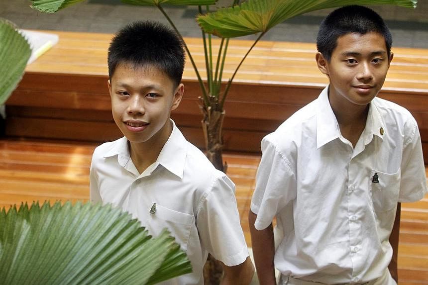 Secondary 2 students Edmund Ong (left) and Zhang Weiyao were recipients of the Junior Raffles Institution Scholarships.