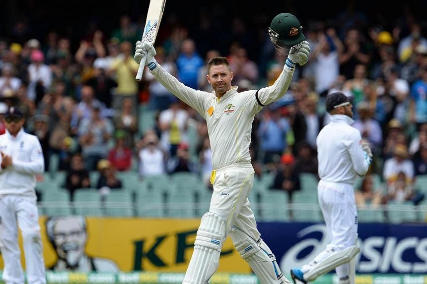 In this file photo dated Dec 6, 2013, Australian batsman Michael Clarke (centre) celebrating after scoring a century against England on the second day of the second Ashes cricket Test match in Adelaide.&nbsp;Australian cricket captain Michael Clarke 
