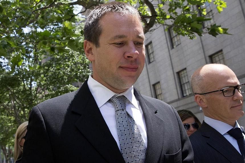 Eric Prokopi (left) exits the US District Court for the Southern District of New York in Lower Manhattan following a sentencing hearing, on June 3, 2014. -- PHOTO: REUTERS