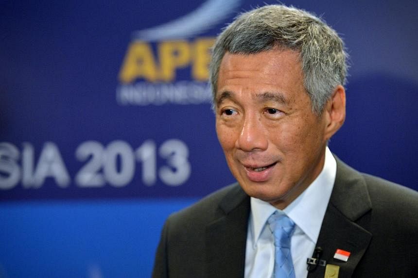 Prime Minister Lee Hsien Loong (above) and Minister for Communications and Information Yaacob Ibrahim yesterday posted comments on the need to practice freedom of speech responsibly online. -- ST PHOTO: KUA CHEE SIONG