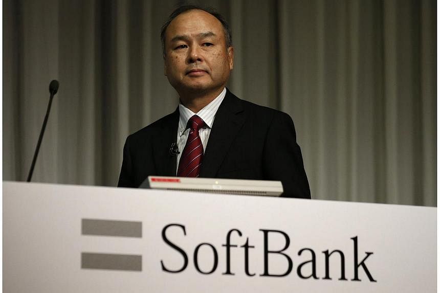 SoftBank Corp Chief Executive Masayoshi Son attends a news conference in Tokyo on May 7, 2014. -- PHOTO: REUTERS
