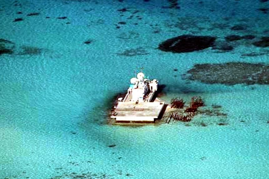 A view of Johnson South Reef, known to China as Chigua Reef, in the South China Sea in this handout photograph taken on February 28, 2013 by the Armed Forces of the Philippines and released by the Department of Foreign Affairs (DFA) on May 14, 2014. 