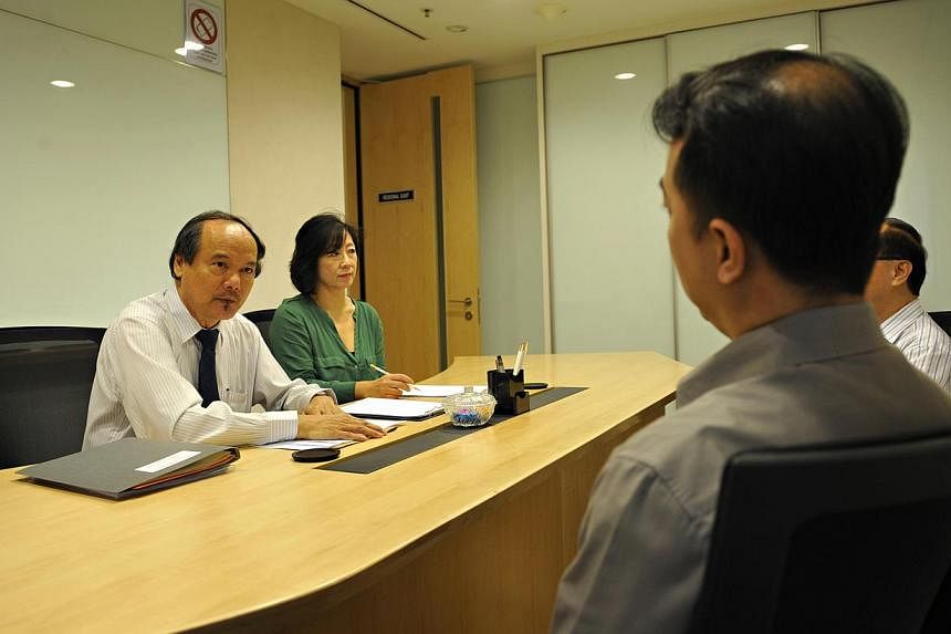 Dr Lim Lan Yuan (left) and Madam June Wong conducting a mock mediation session. -- PHOTO: ST FILE