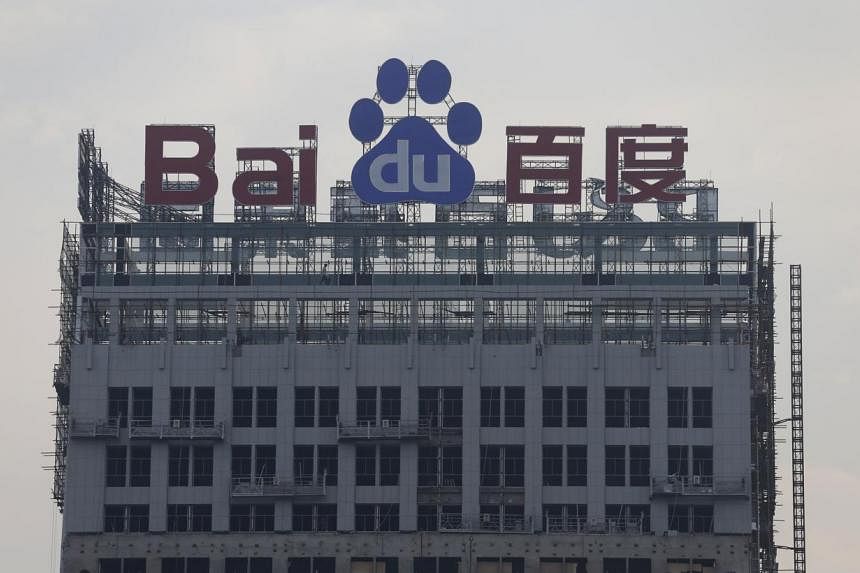 A logo of Baidu is seen at the top of a building under construction in Wuhan, Hubei province, on Aug 31, 2012.&nbsp;Chinese censors are investigating 52 websites owned by companies including top search engine Baidu and online video business Youku Tud