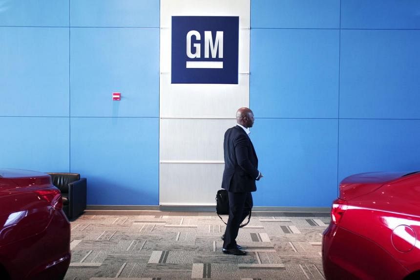 A person walks past the GM logo at the General Motors Technical Center as General Motors Chief Executive Officer Mary Barra holds a press conference on June 5, 2014 in Warren, Michigan.&nbsp;General Motors chief executive Mary Barra said that the com