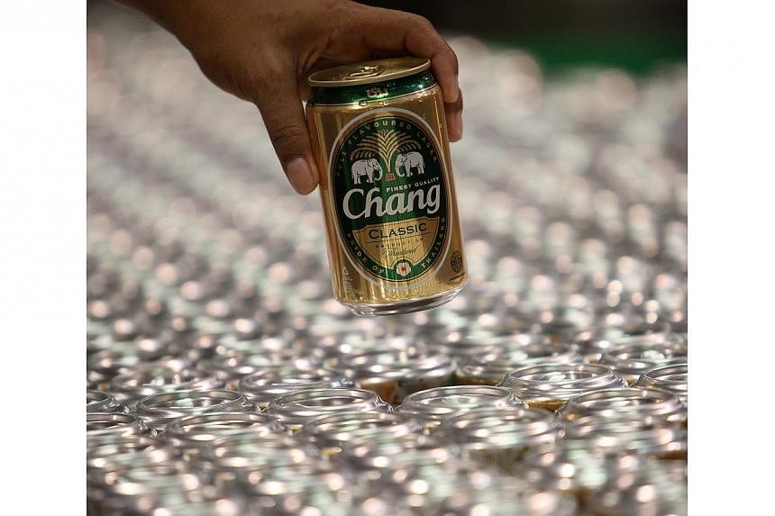 Thai Bev's defensive alcoholic portfolio will provide shelter against any economic contraction triggered by political uncertainty. -- PHOTO: BLOOMBERG
