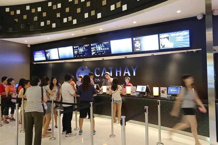 Ticket counter at Cathay Jem cinema. Some moviegoers have kicked up a fuss online after finding out that prices for one of Singaporeans' favourite leisure activities have crept up. -- PHOTO: ST FILE