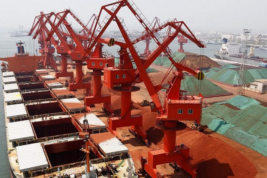 Metals are seen transported at Qingdao port, Shandong province. Shares in China's Qingdao Port International are set to open flat in their Hong Kong trading debut on Friday amid concern that the company could be hurt by a probe into metal financing a
