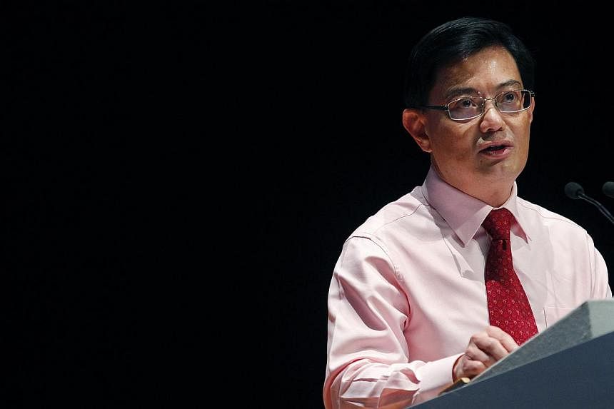Thousands of foreign fighters from some 50 countries have gone to Syria to fight against President Bashar al-Assad's regime, and Singaporeans are "not immune to the call to fight", said Education Minister Heng Swee Keat on Saturday. -- ST PHOTO: TED 
