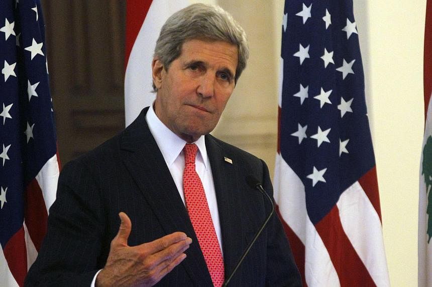 US Secretary of State John Kerry (above) gestures as he speaks during a news conference after meeting with Lebanon's Prime Minister Tammam Salam at the government palace in Beirut on June 4, 2014. -- PHOTO: REUTERS