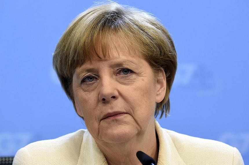Germany's Chancellor Angela Merkel holds a press conference on the last day of the G7 summit at the European Council headquarters on June 5, 2014, in Brussels.&nbsp;Balkan countries have a "clear prospect" of joining the European Union, but the proce