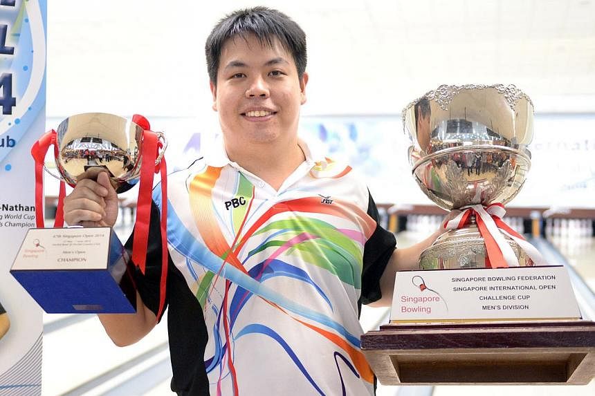 The Republic's keglers dominated the podium at the 47th Singapore International Open at Orchid Bowl on Saturday, as 33-year-old Vincent Lim become the first Singaporean to clinch the Men's Open title since 2006. -- ST PHOTO:&nbsp;LIM SIN THAI