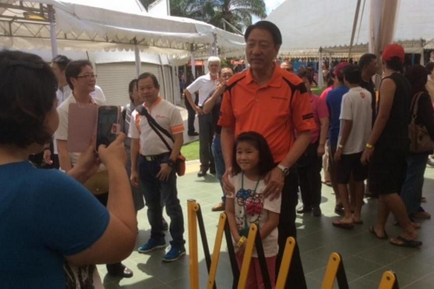 The carnival was attended by Deputy Prime Minister and Home Affairs Minister Teo Chee Hean, who is the anchor minister for Pasir Ris Punggol GRC. -- ST PHOTO: TOH YONG CHUAN
