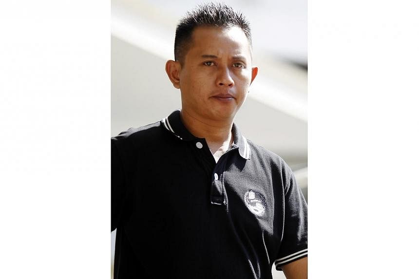 Mohamad Noor Ali, 42, now a logistics assistant, admitted to engaging in commercial sex after he paid a 17-year-old Vietnamese girl $100 for her services at Golden Star Hotel in Lorong 8 Geylang on Oct 28 last year. -- ST PHOTO: WONG KWAI CHOW