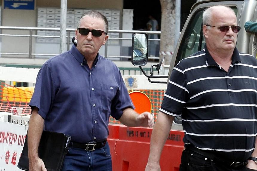 Two British bankers,Timothy Nicholas Goldring (left) and John Andrew Nordman&nbsp;were jailed for a total of 15 years on Monday, June 09, 2014, over a bonds scam in which investors lost more than $3 million. -- ST PHOTO:&nbsp;WONG KWAI CHOW&nbsp;