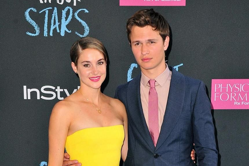 Shailene Woodley (left) and Ansel Elgort attend The Fault in Our Stars premiere at the Ziegfeld Theater on June 2, 2014 in New York City. Romantic drama The Fault In Our Stars seduced more fans than Tom Cruise’s latest action flick to top North Ame