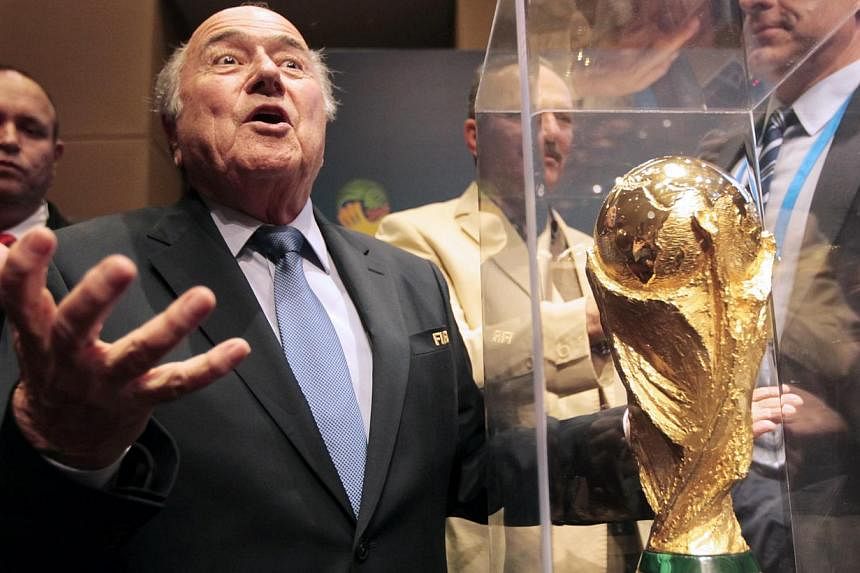 World football chief Sepp Blatter vowed to fight critics trying to destroy Fifa on Monday as he launched a staunch defence of his scandal-tainted organisation. -- PHOTO: REUTERS