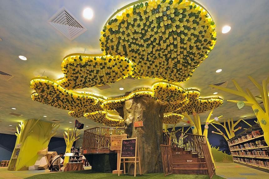 Visitors to the Singapore Book Fair can go to My Tree House, a "green library" which is based on the one atthe Central Public Library (above) in Victoria Street. -- ST FILE PHOTO