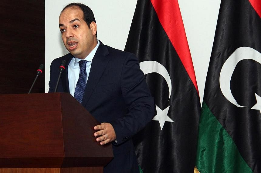 Libya's supreme court on Monday ruled as unconstitutional the interim parliament's election of premier Ahmed Miitig, seemingly ending a month-long crisis that saw two rival cabinets jostling for power. -- PHOTO: AFP