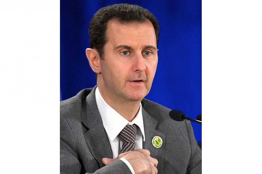 Syria's President Bashar al-Assad announced an unprecedented prisoner amnesty on Monday, less than a week after his re-election, the most wide-ranging since the revolt against him began. -- PHOTO: AFP