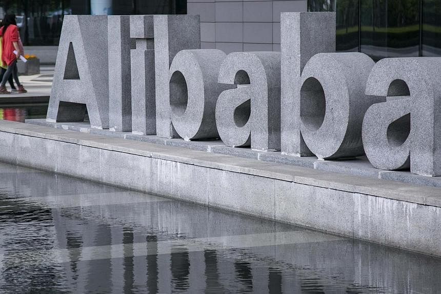 People walk at the headquarters of Alibaba in Hangzhou, Zhejiang province, April 23, 2014.&nbsp;Chinese e-commerce company Alibaba Group Holding unveiled its first direct-to-consumer online shop in the United States on Wednesday, looking to take on A