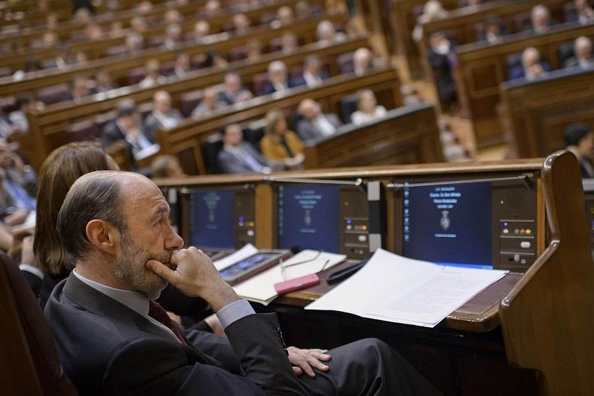 Socialist Party (PSOE) member Alfredo Perez Rubalcaba sits in Spain's lower house of parliament on June 11, 2014, during a session to vote on the bill allowing the abdication of King Juan Carlos with the senate following suite on June 17.&nbsp;Spanis