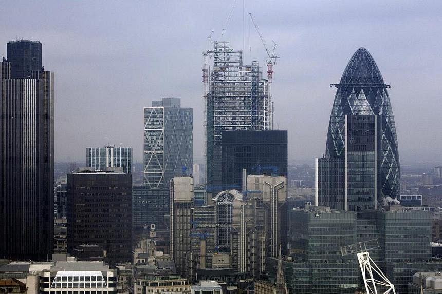 The skyline of London. Standard &amp; Poor's lifted on Friday its outlook on Britain's credit rating to stable from negative, citing the broad recovery and progress in consolidating public finances, and confirmed its top 'AAA' assessment. -- PHOTO: B