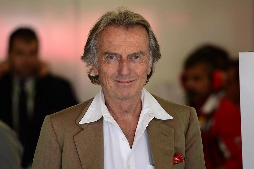 Ferrari's president Luca Cordero di Montezemolo stands in the pits during the second practice session at the Circuit de Catalunya, in Montmelo, on the outskirts of Barcelona on May 9, 2014, ahead of the Spanish Formula One Grand Prix. -- PHOTO: AFP