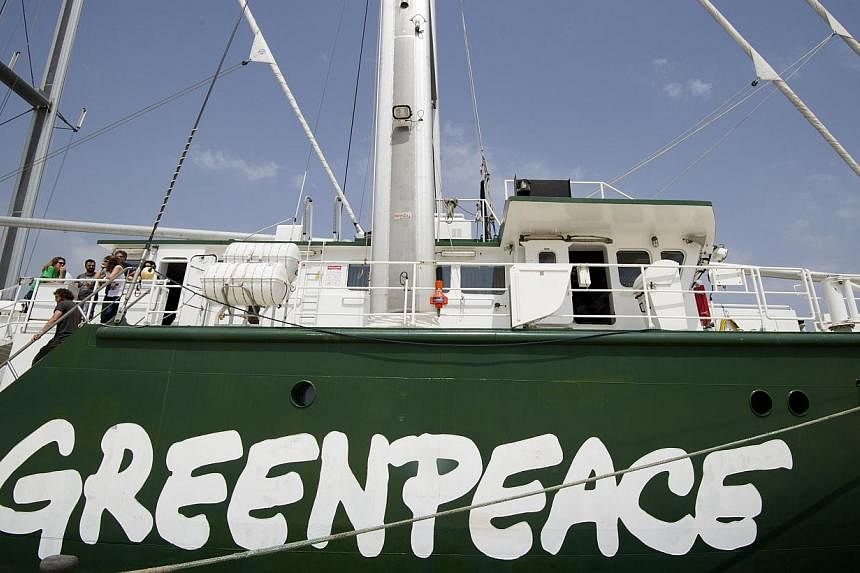 A Greenpeace employee has been fired after losing the environmental charity 3.8 million euros (S$6.4 million) in a failed gamble on international currency markets, the group said on Sunday, June 15, 2014. -- PHOTO: AFP