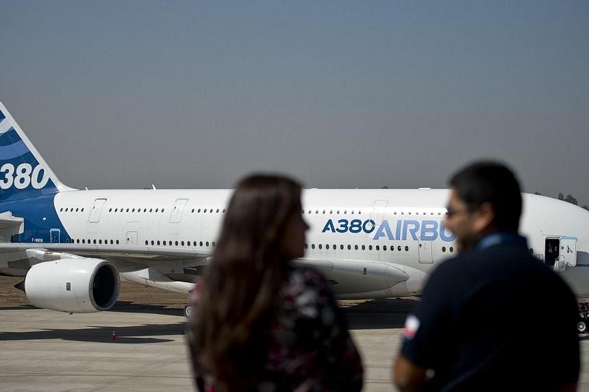 Delivery of the first three Airbus A380 superjumbos to Qatar Airways has hit a further delay of several weeks due to unresolved cabin issues, the airline's chief executive said. -- PHOTO: AFP