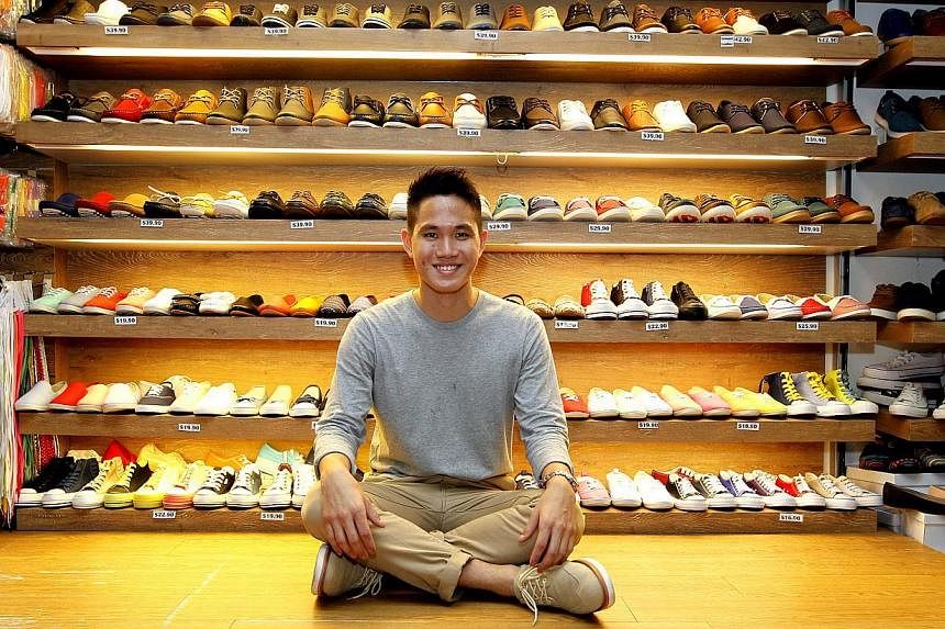 Mr Victor Shi (above), owner of men's shoes and clothing company Jetsetters, has three shops in Bugis Street (left) and recently started selling products on the online store run by Bugis Street Online, a subsidiary of the Bugis Street management.