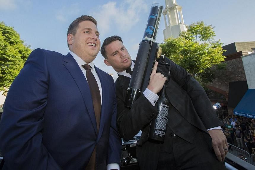 Cast members Channing Tatum (right) and Jonah Hill pose at the premiere of "22 Jump Street" in Los Angeles, California on June 10, 2014. -- PHOTO: REUTERS