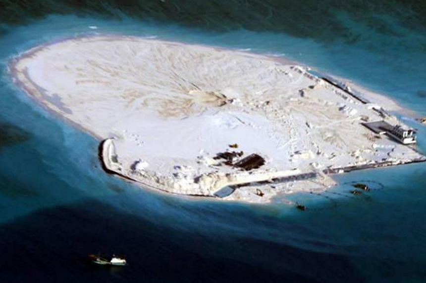 A view of Johnson South Reef, known to China as Chigua Reef and which the Philippines calls Mabini Reef, in the South China Sea in this handout photograph taken on March 11, 2014, by the Armed Forces of the Philippines and released by the Department 
